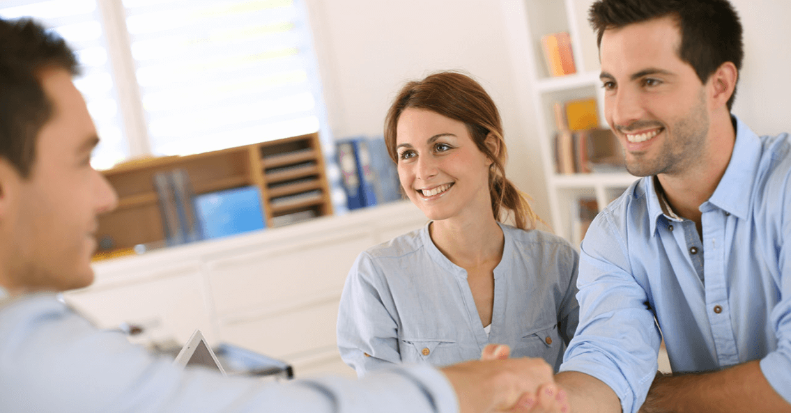 Cheerful Couple Talking With the Person